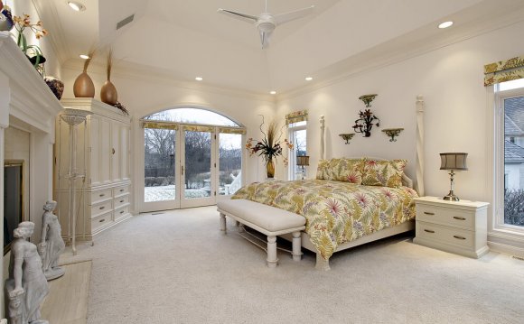Ornate white master bedroom